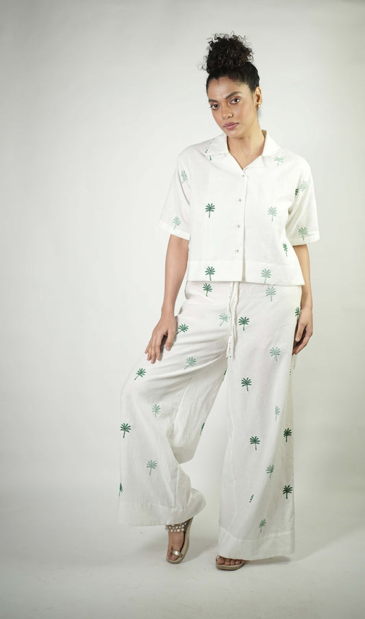 White linen palm tree embroidered trousers
