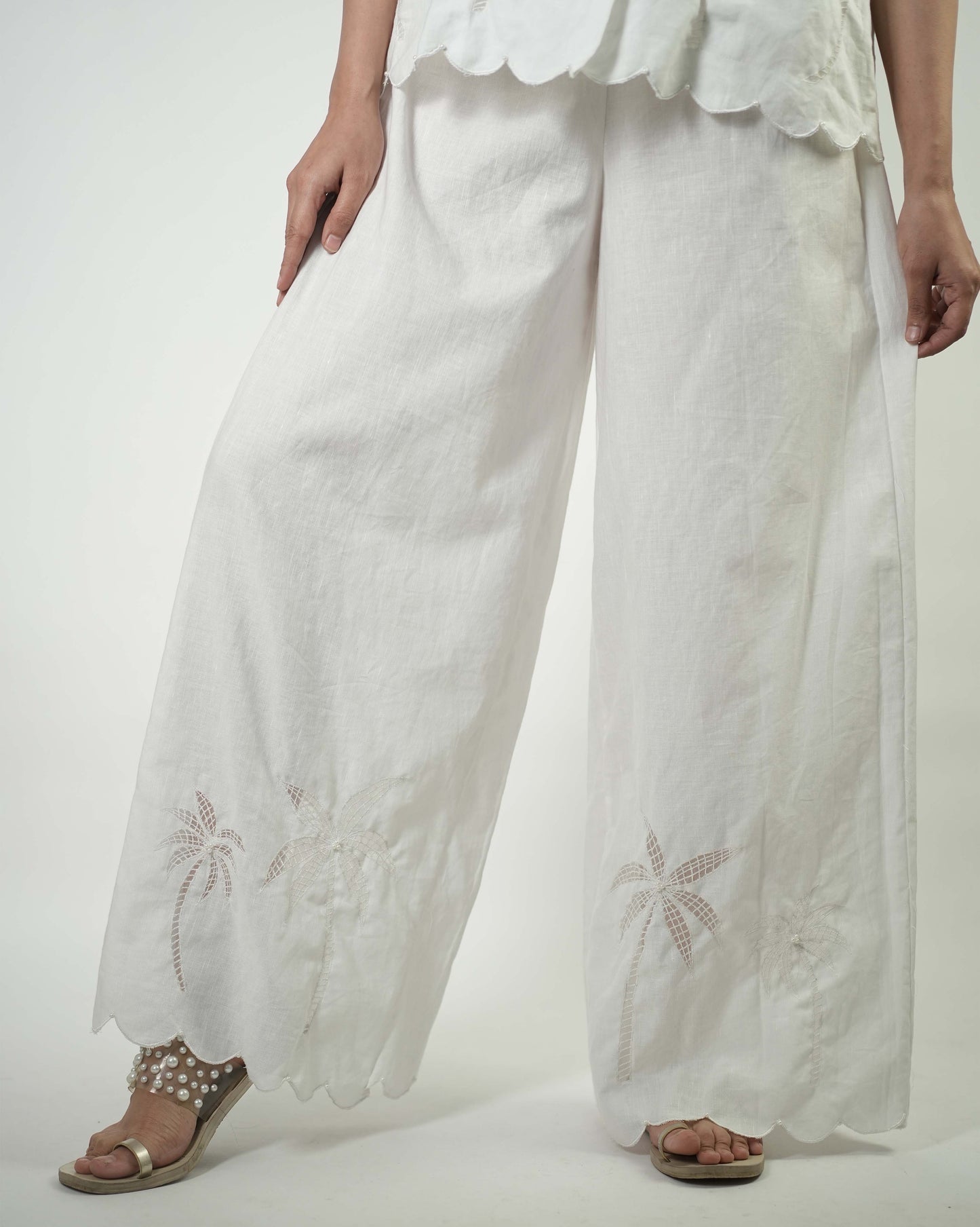 White linen trousers with scallop edge and embroidery