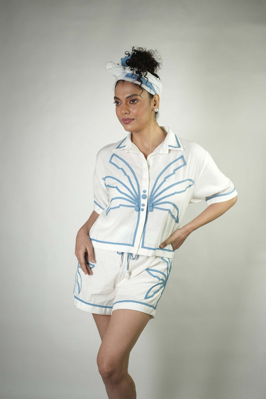 Hand stitched palm tree motif linen shorts