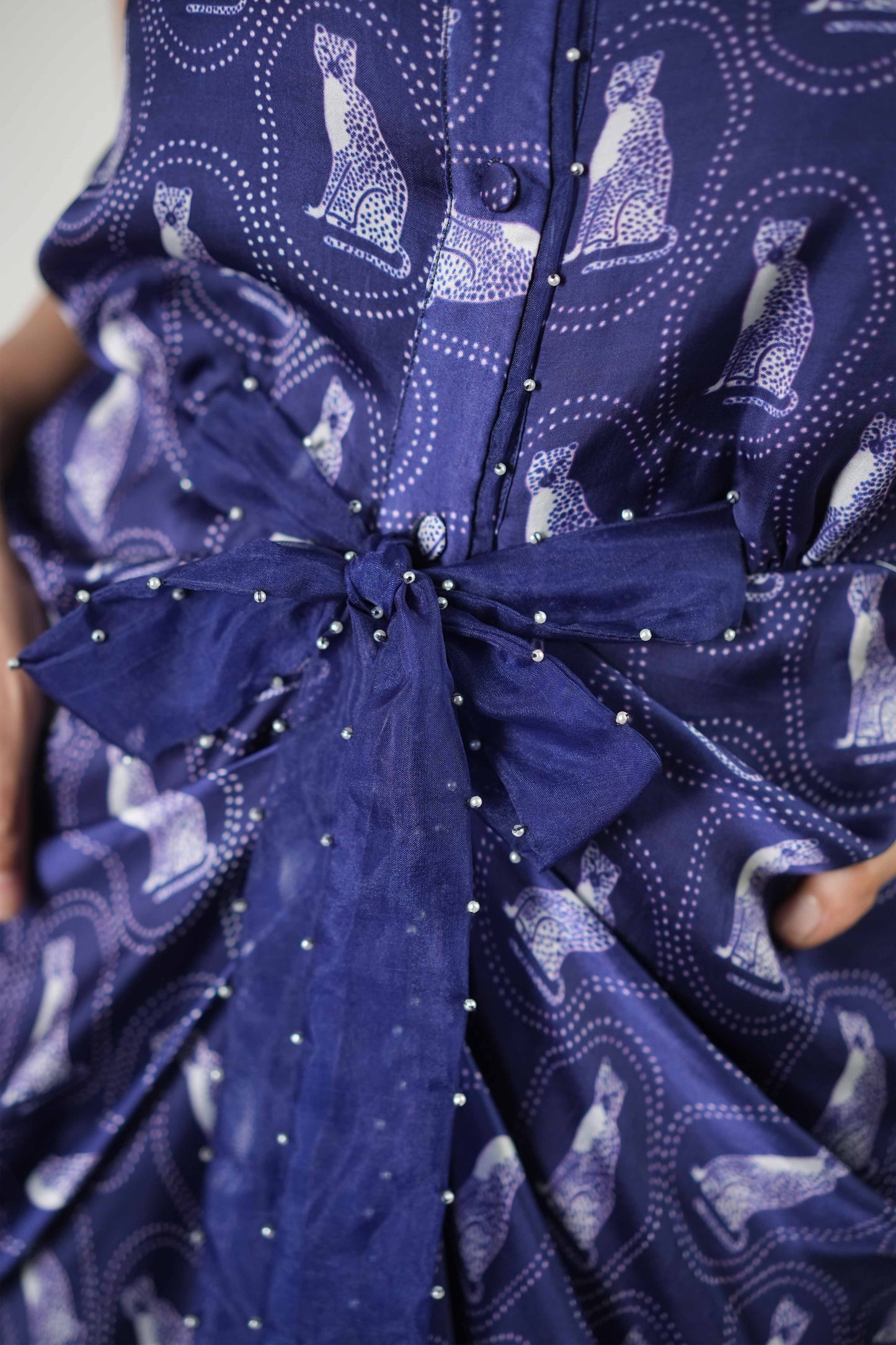 Cheetah printed draped dress with organza detailing