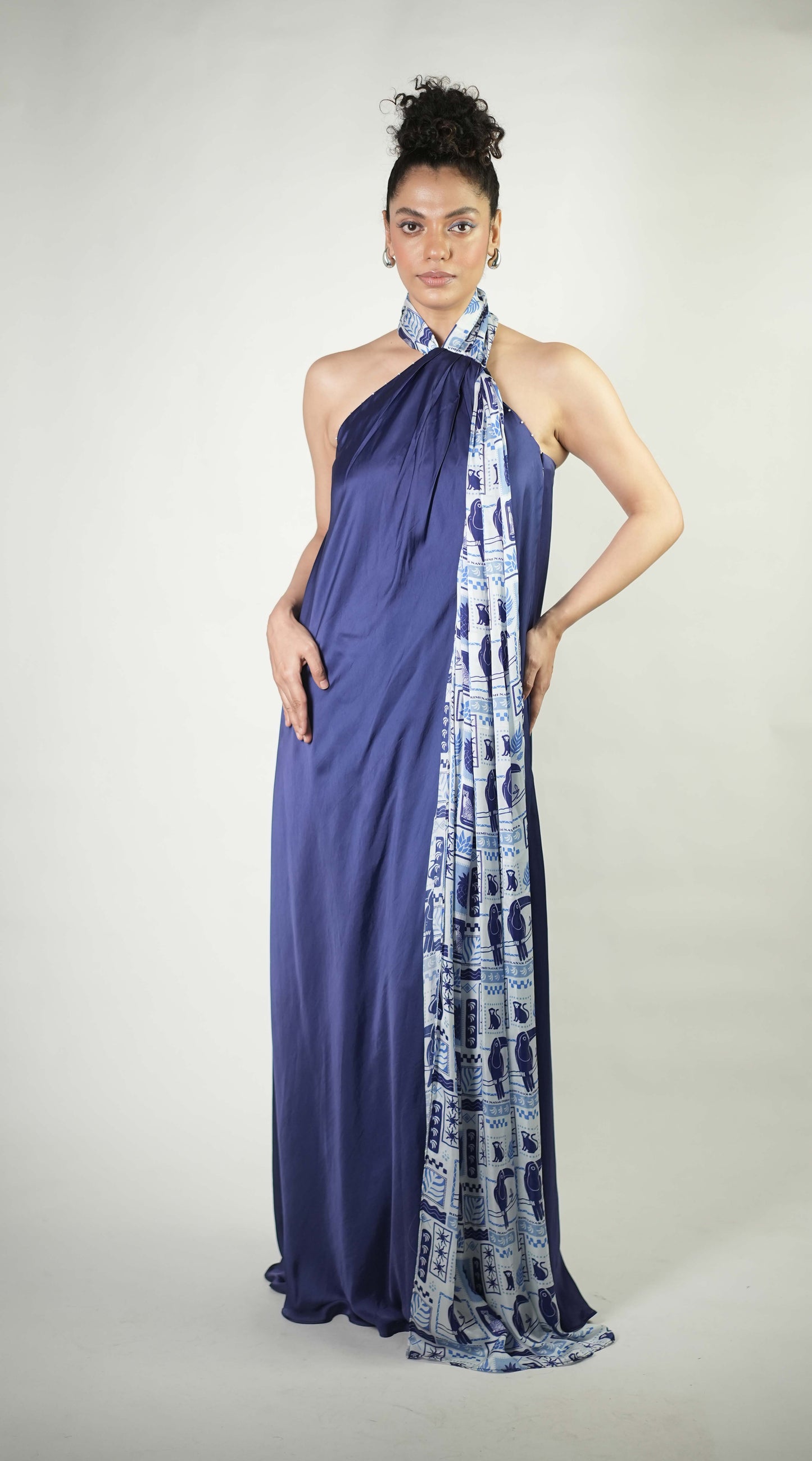 Halter gown with tropical elements printed drape detailing