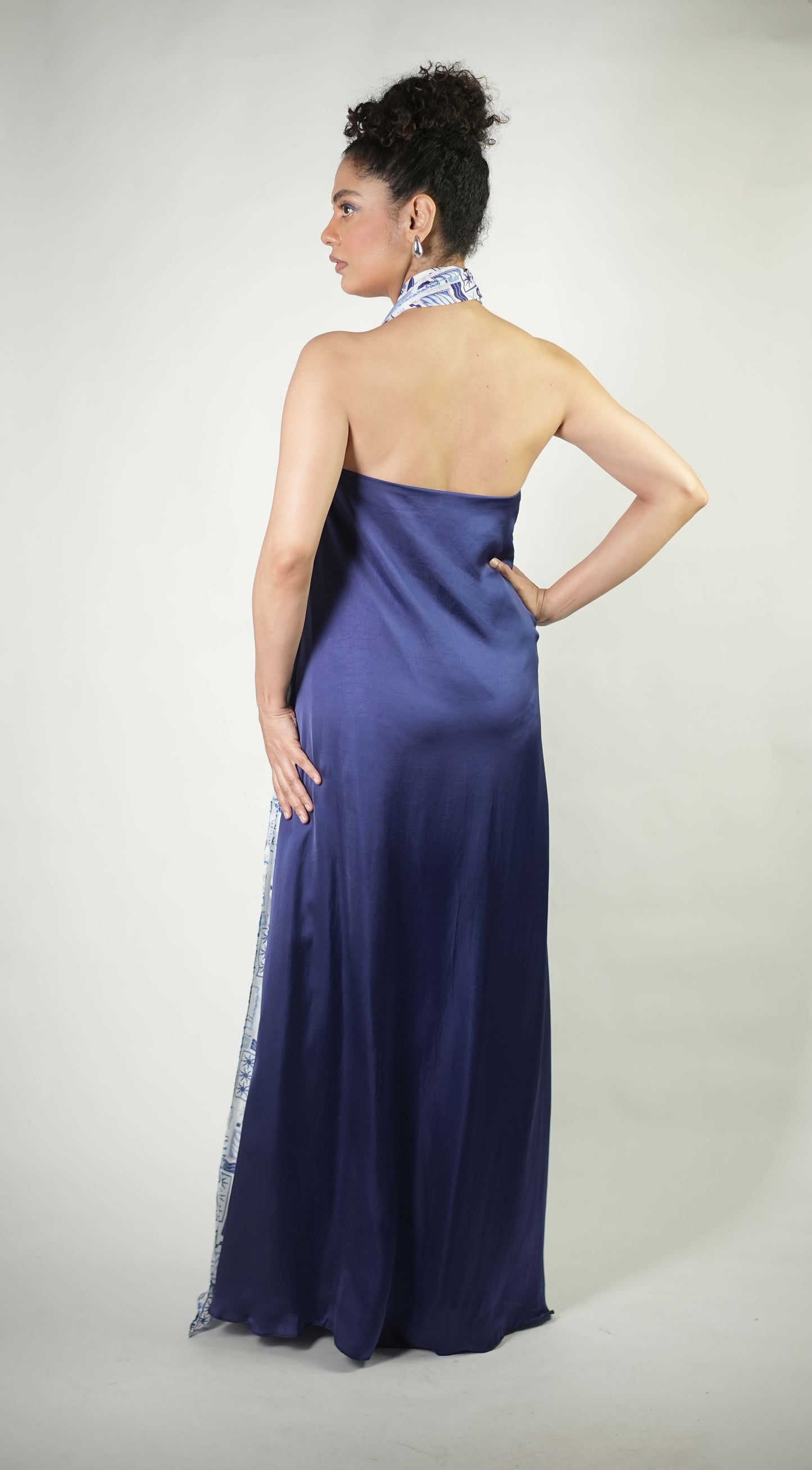 Halter gown with tropical elements printed drape detailing