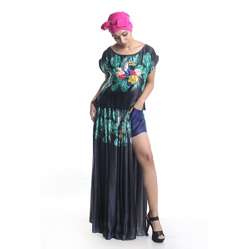 TOUCAN PRINTED WITH EMBROIDERY HIGHLIGHTING CROP TOP WITH PLEATED SKIRT TEAMED WITH SHEER SHORTS