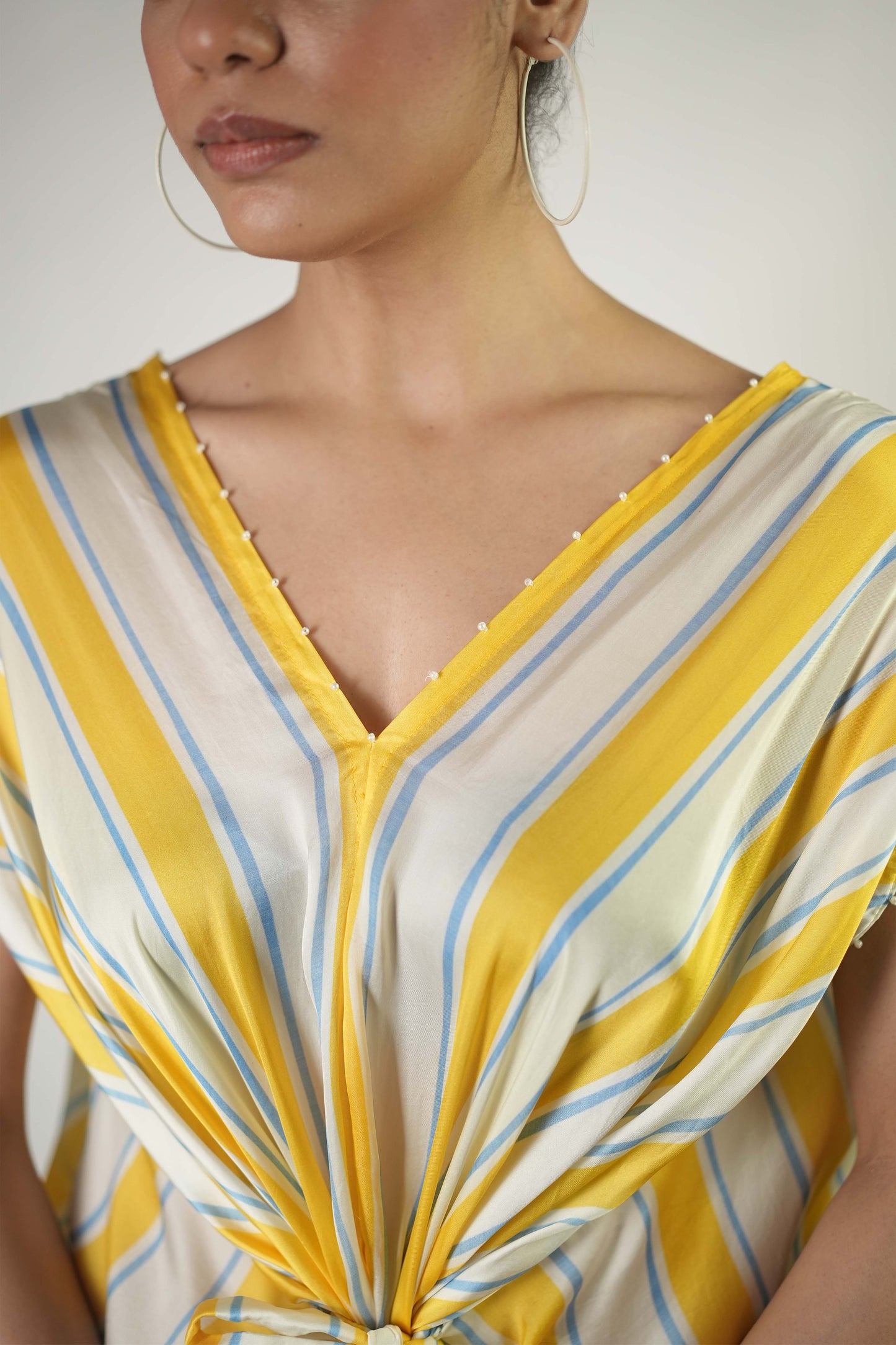 Bold stripe printed draped dress with tie up detailing